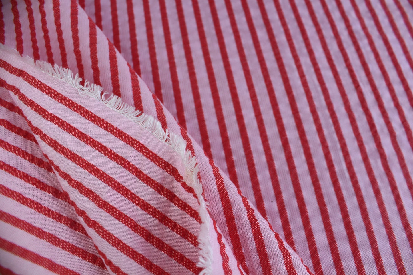 Red & Pink Stripe Poly-Cotton Seersucker – 62" Wide | Slightly Heavy, Textured Fabric for Apparel & Décor