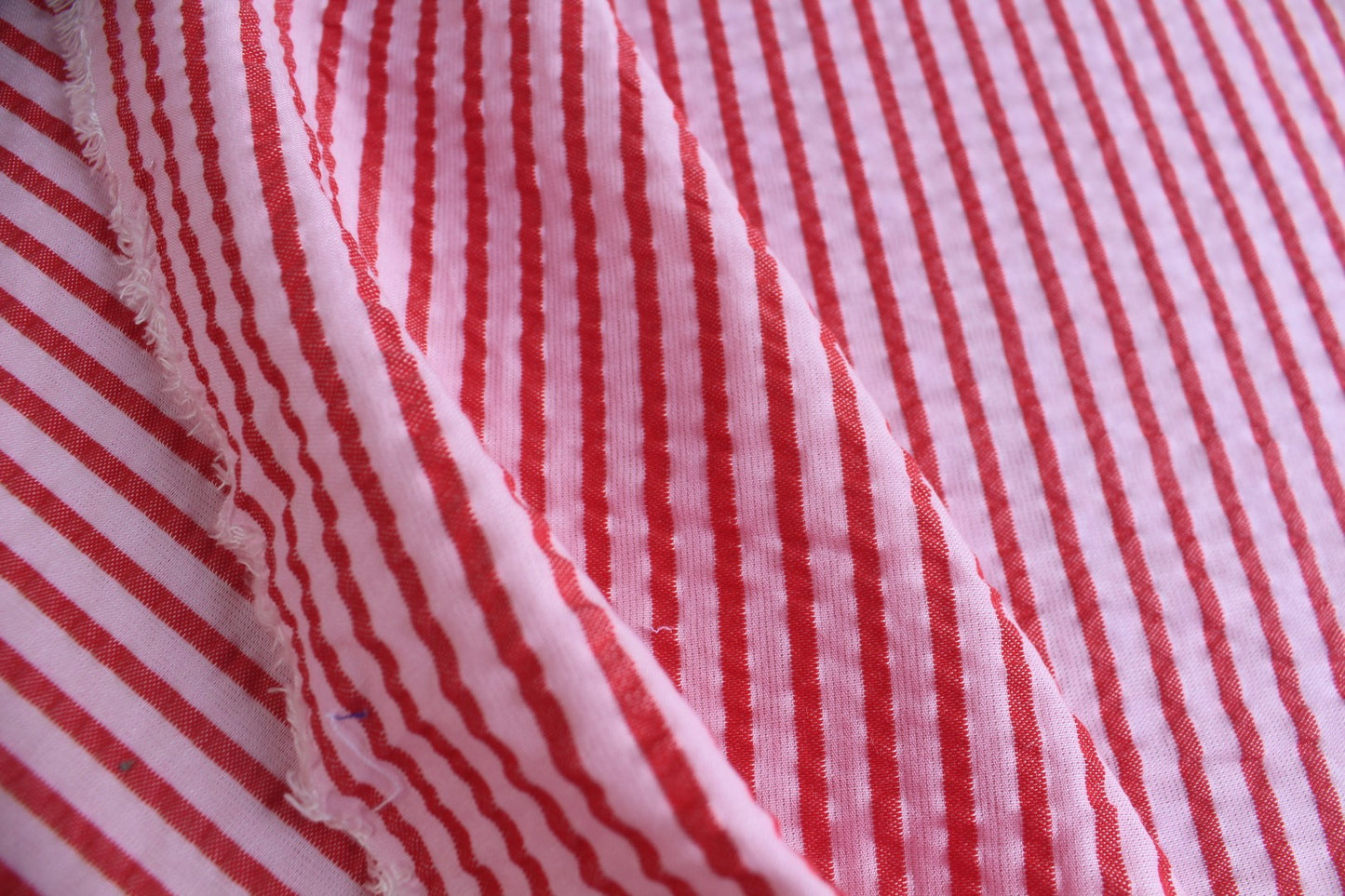 Red & Pink Stripe Poly-Cotton Seersucker – 62" Wide | Slightly Heavy, Textured Fabric for Apparel & Décor