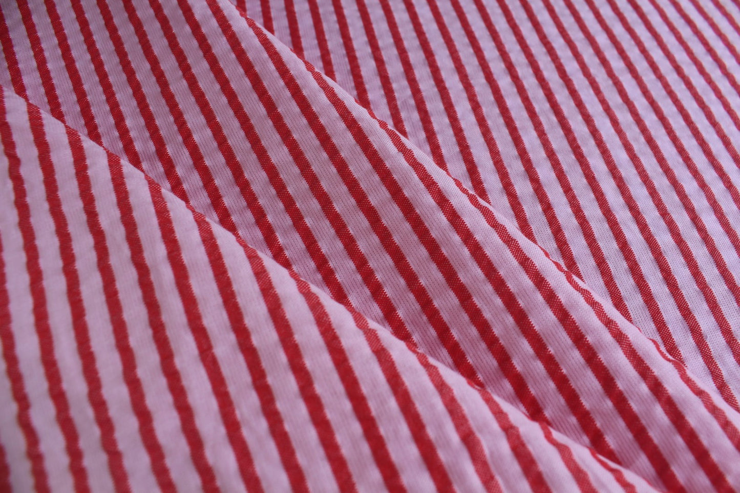 Red & Pink Stripe Poly-Cotton Seersucker – 62" Wide | Slightly Heavy, Textured Fabric for Apparel & Décor